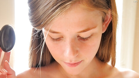 Lara Brookes squeezes her natural tits and sticks bananas in her twat